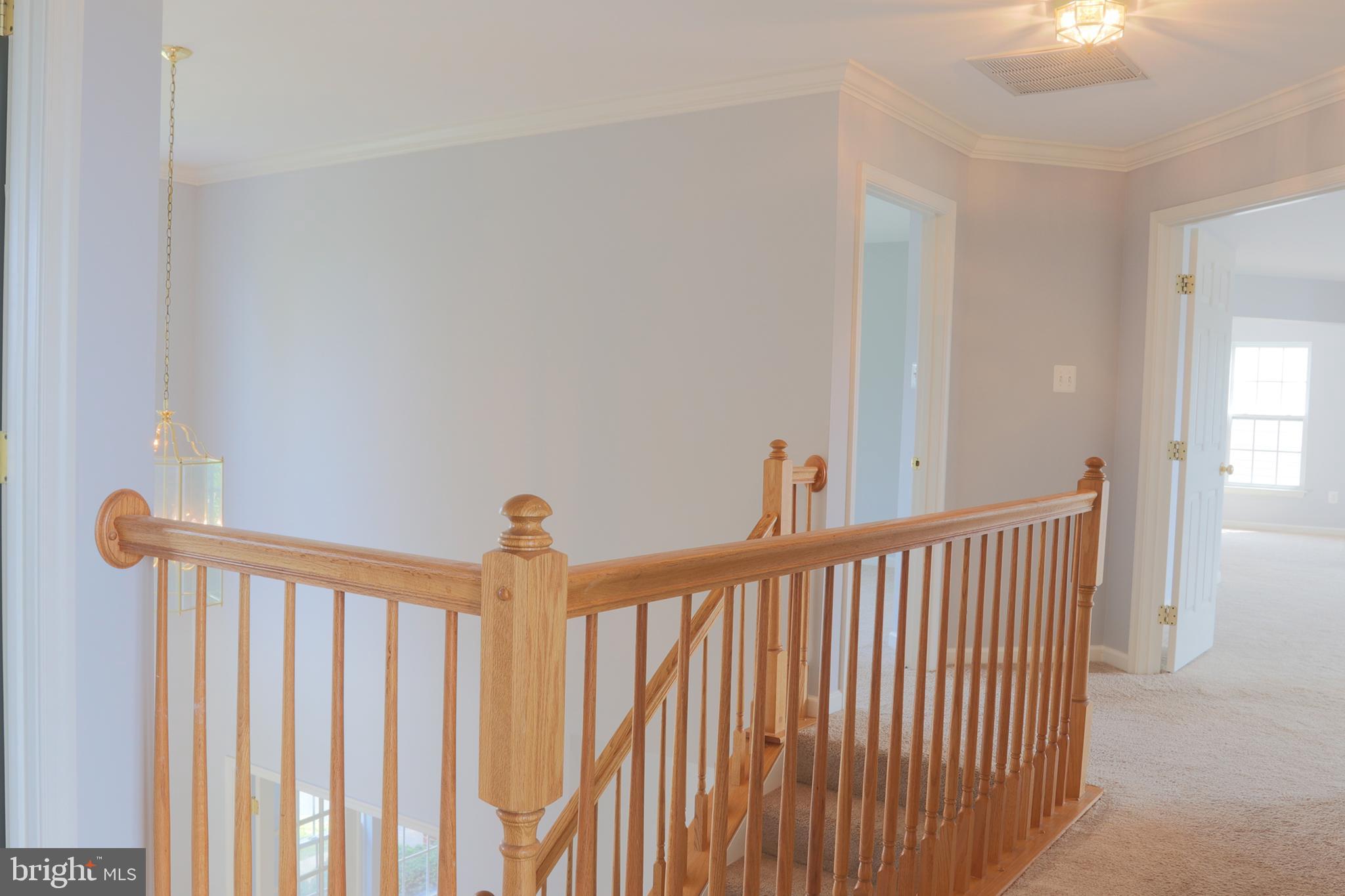 14404 Autumn Crest Road Boyds, MD 20841 - Photo 46 of 103 a view of a hallway with windows