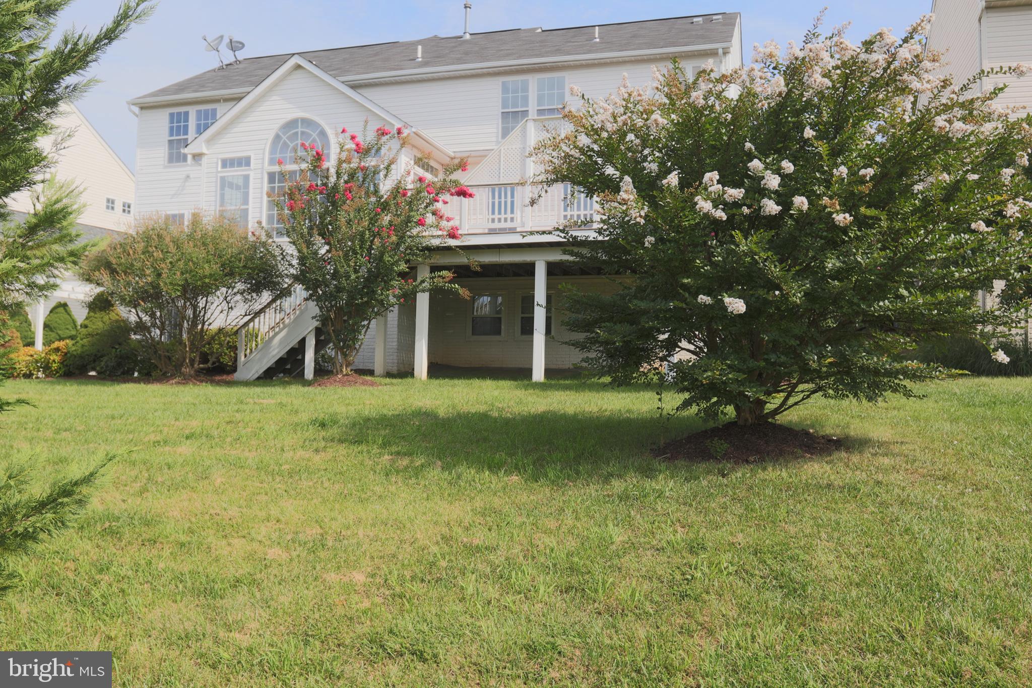 14404 Autumn Crest Road Boyds, MD 20841 - Photo 6 of 103 a view of a house with a backyard