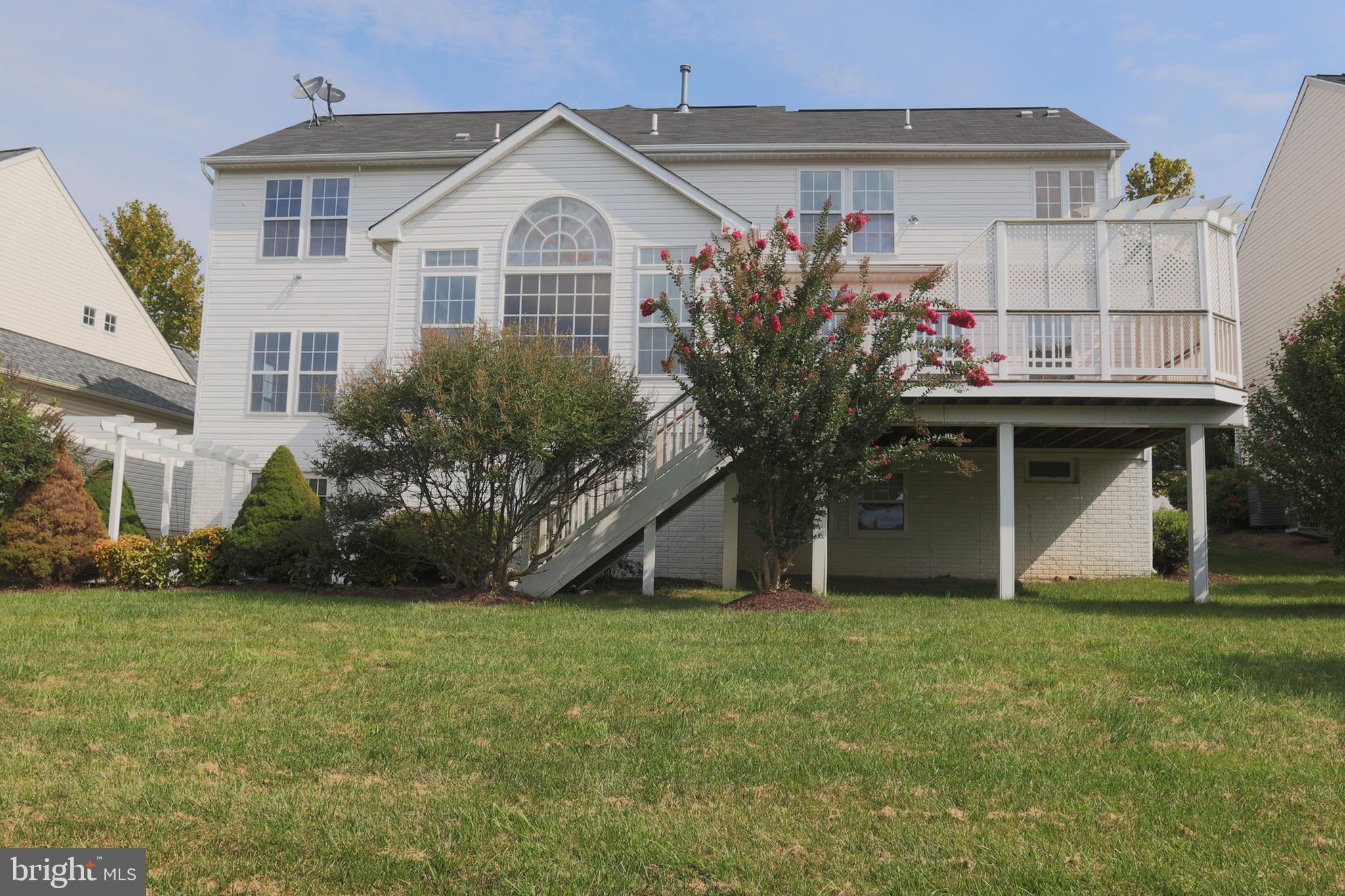 14404 Autumn Crest Road Boyds, MD 20841 - Photo 10 of 103 a front view of a house with a yard