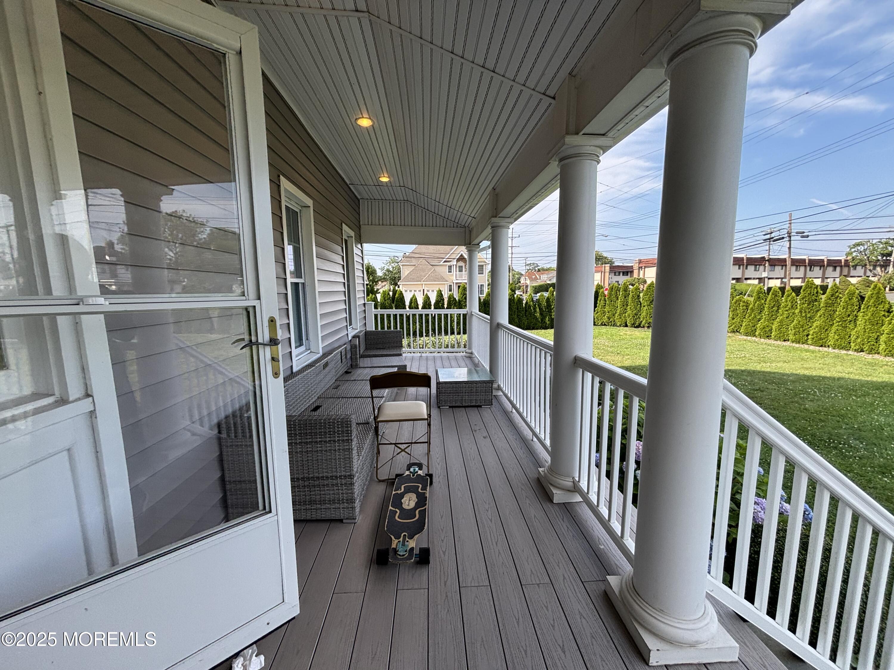 516 2nd Avenue Long Branch, NJ 07740 - Photo 17 of 52 a view of a balcony with wooden floor