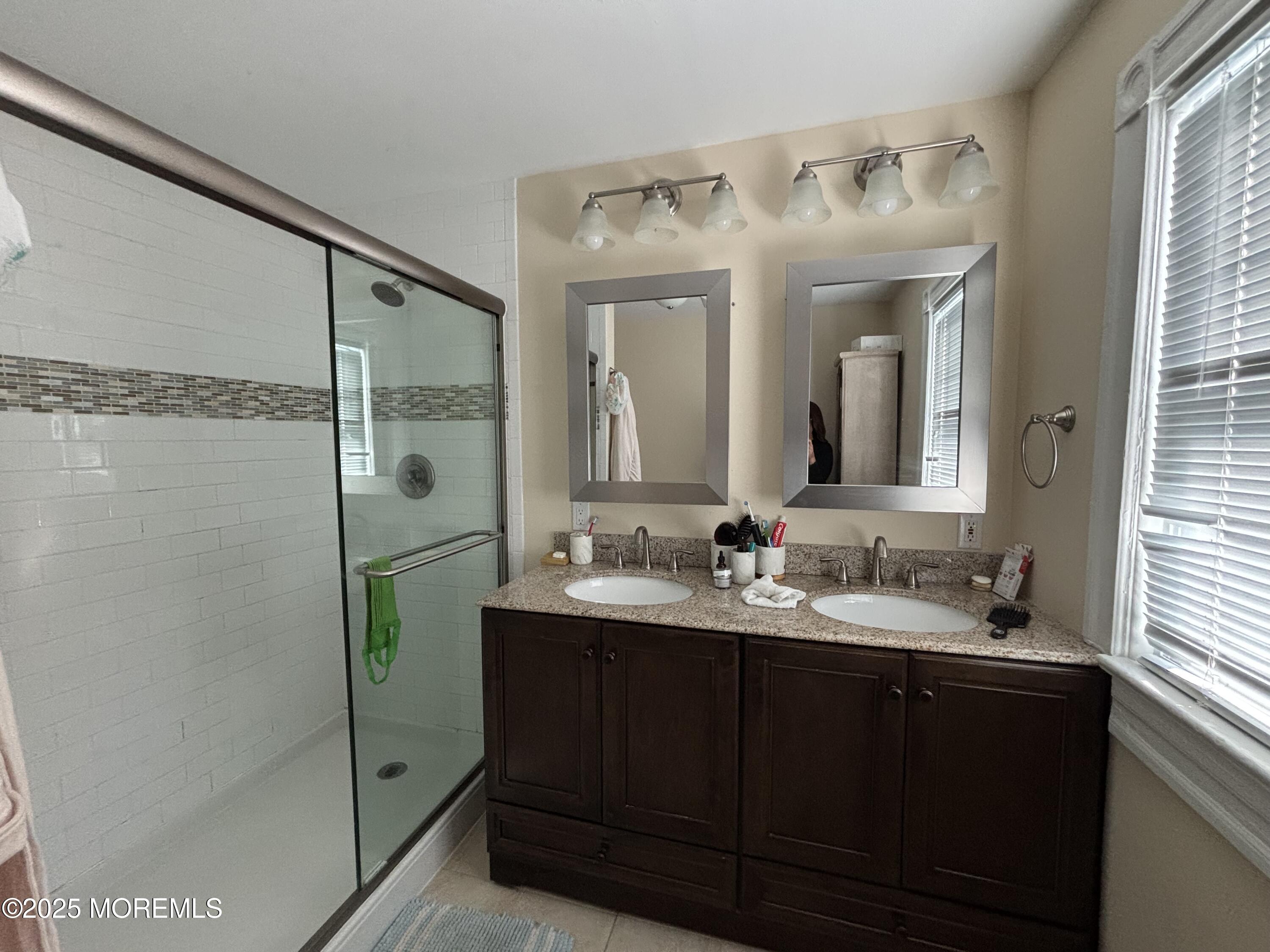 516 2nd Avenue Long Branch, NJ 07740 - Photo 22 of 52 a bathroom with a double vanity sink mirror and double