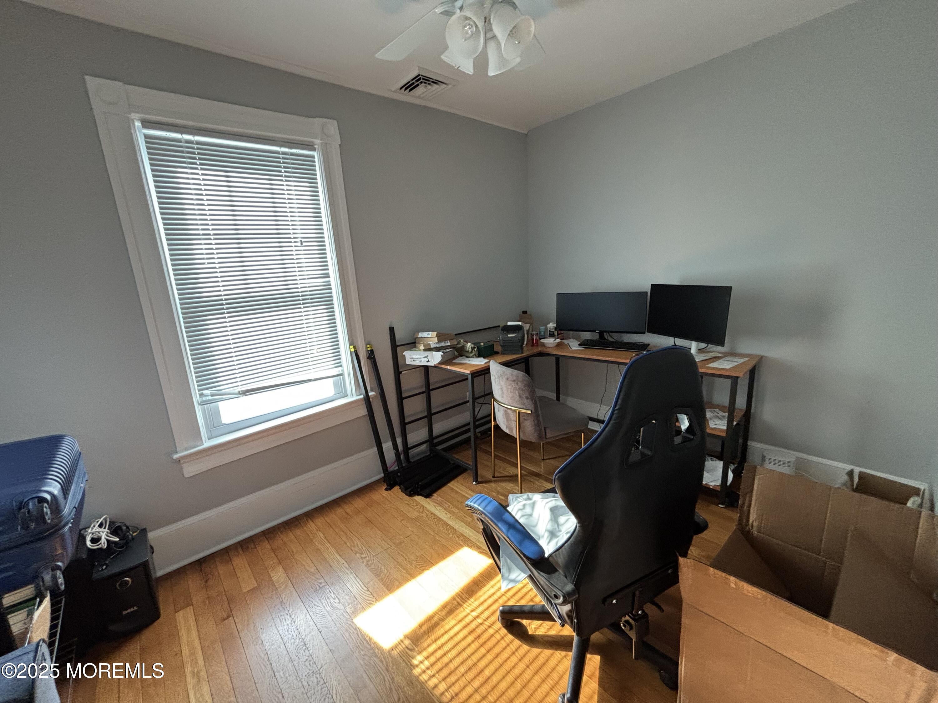 516 2nd Avenue Long Branch, NJ 07740 - Photo 26 of 52 a view of a workspace with furniture and a window