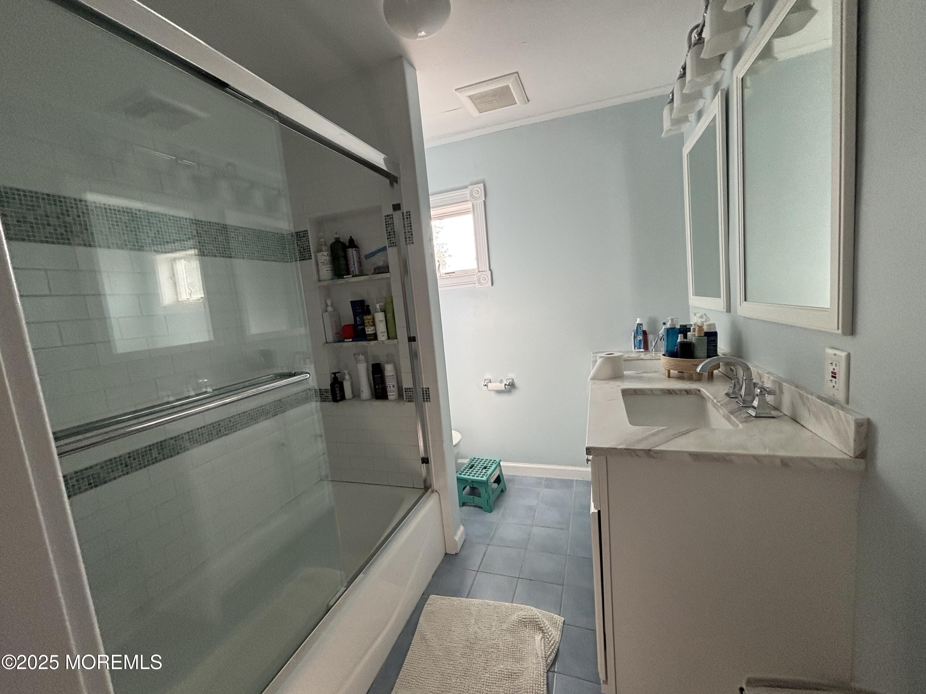 516 2nd Avenue Long Branch, NJ 07740 - Photo 28 of 52 a bathroom with a sink a toilet and shower
