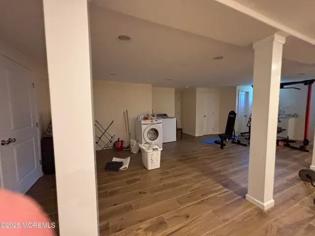 a bed room with a bed and a chair