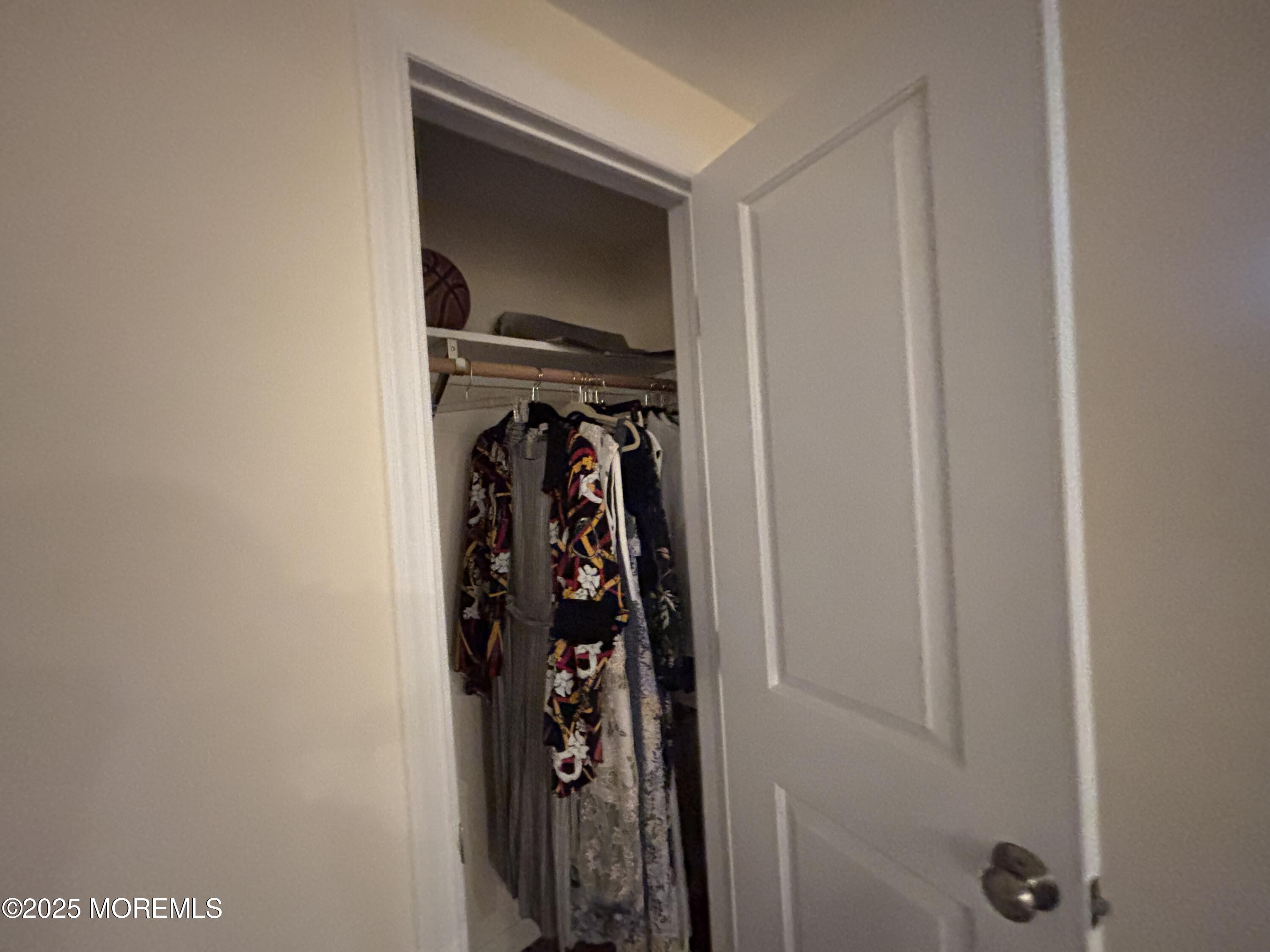 516 2nd Avenue Long Branch, NJ 07740 - Photo 44 of 52 a view of walk in closet with clothes