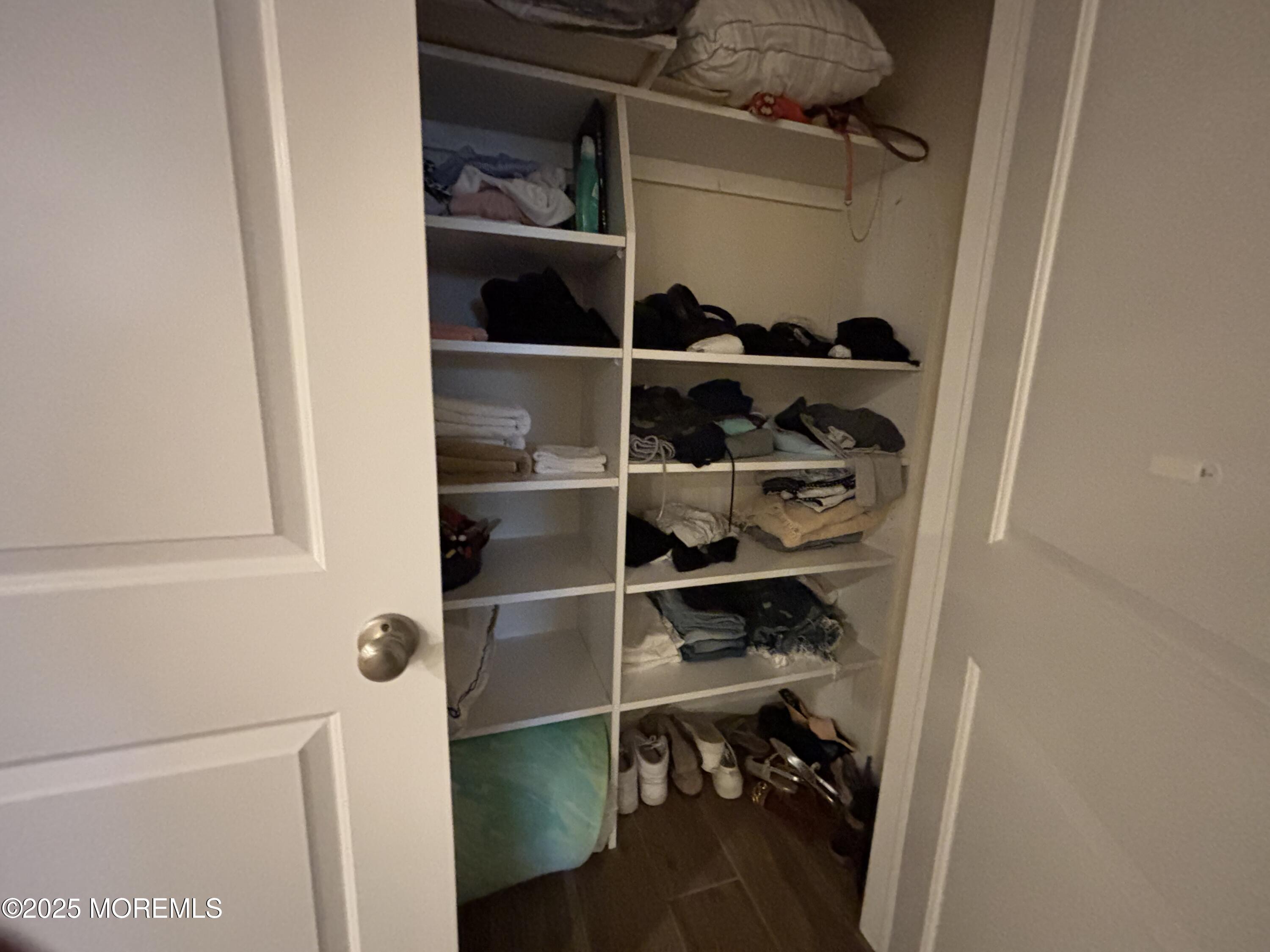 516 2nd Avenue Long Branch, NJ 07740 - Photo 45 of 52 a view of walk in closet with empty racks
