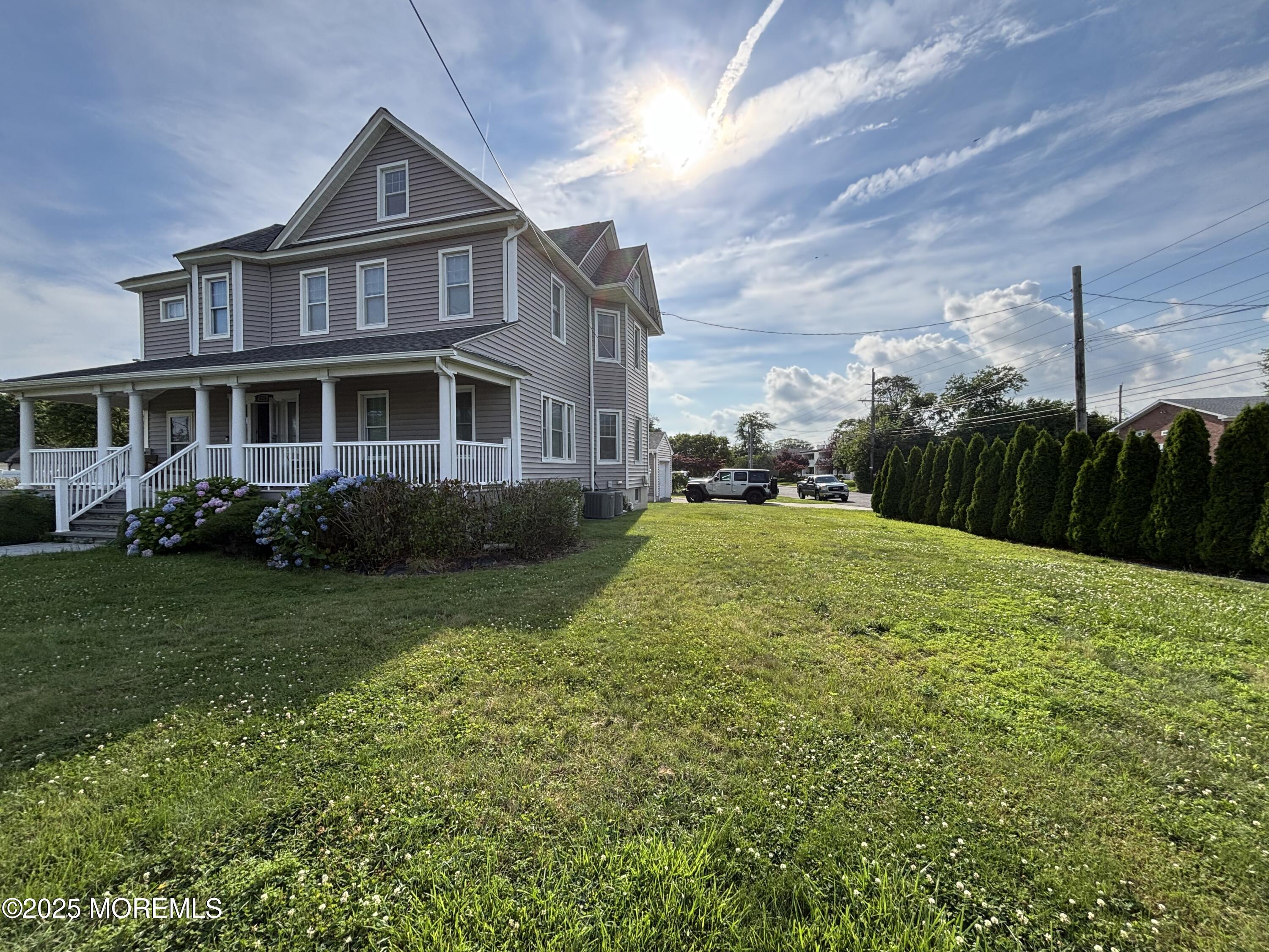 516 2nd Avenue Long Branch, NJ 07740 - Photo 48 of 52 a view of a yard in front of a house