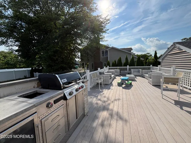 a view of a terrace with furniture