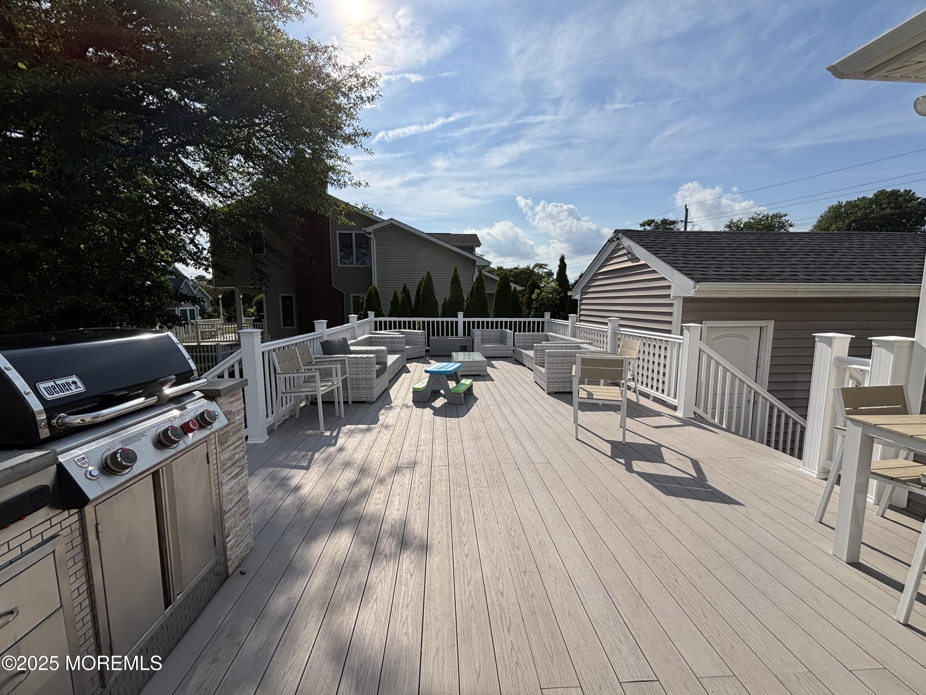 516 2nd Avenue Long Branch, NJ 07740 - Photo 7 of 52 a view of a terrace with furniture