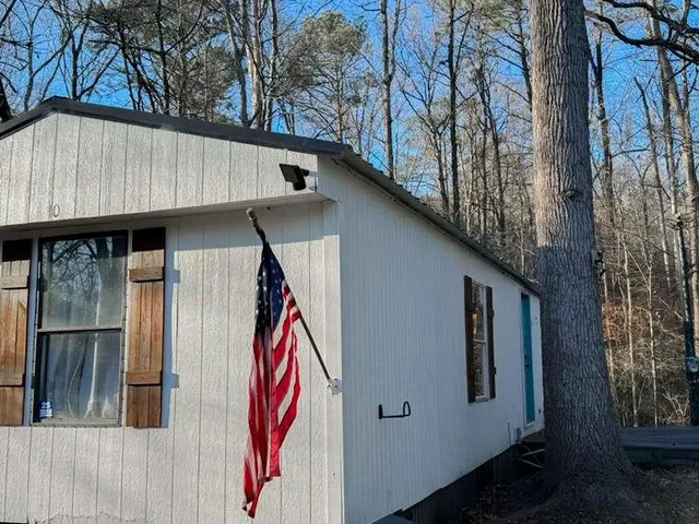 a view of outdoor kitchen and outdoor seating