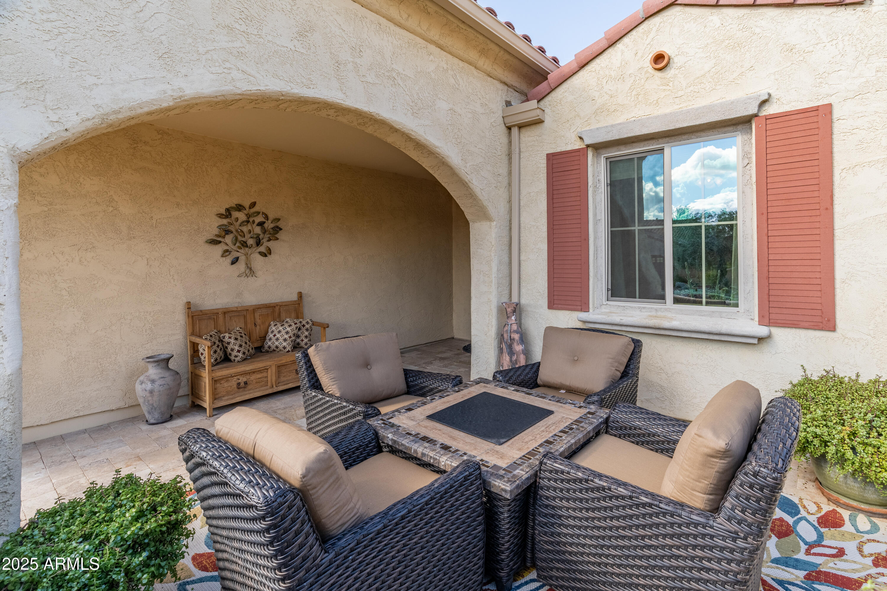 26990 West Utopia Road Buckeye, AZ 85396 - Photo 3 of 41 a balcony view with a couch and table chair