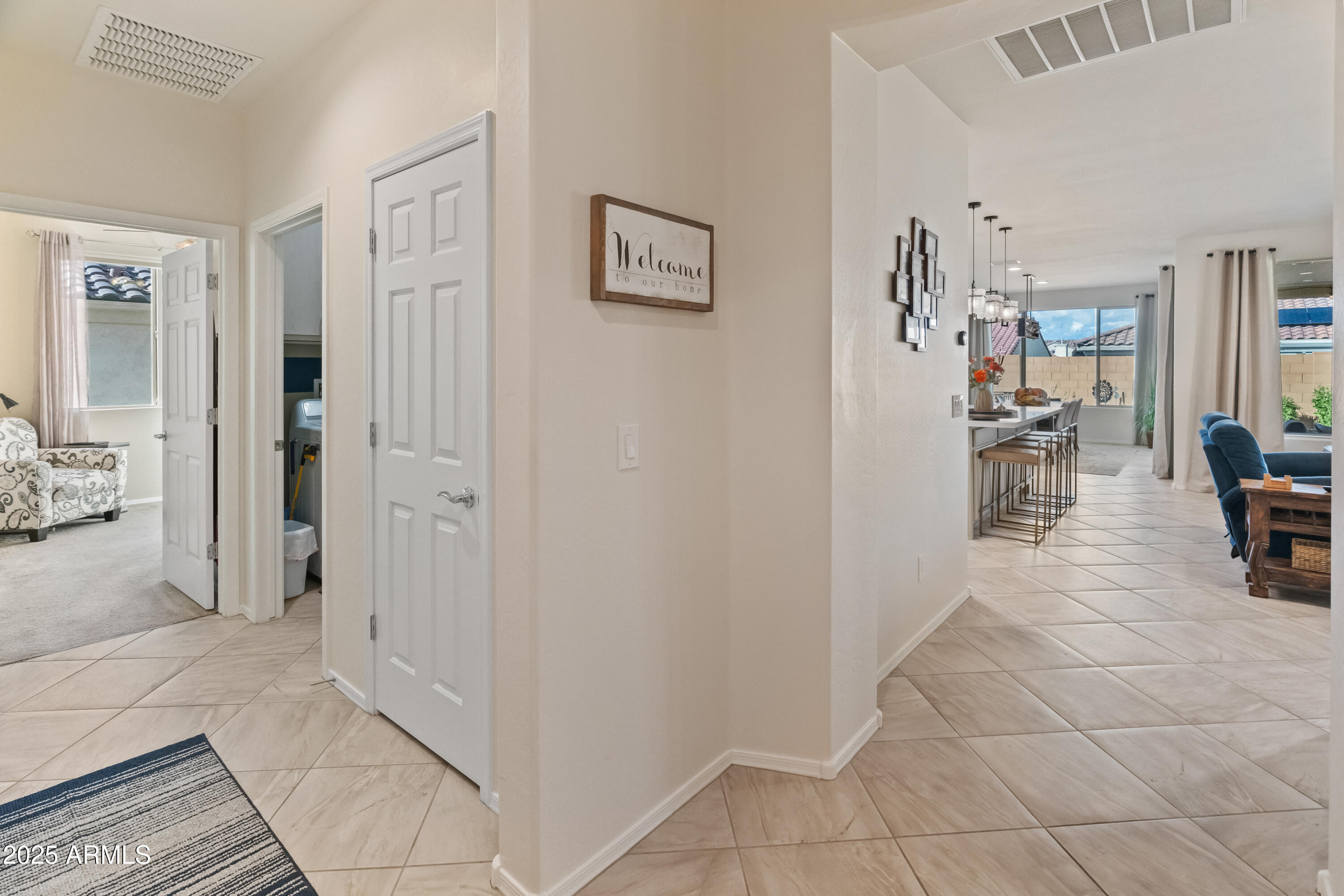 26990 West Utopia Road Buckeye, AZ 85396 - Photo 5 of 41 a view of kitchen with furniture and refrigerator