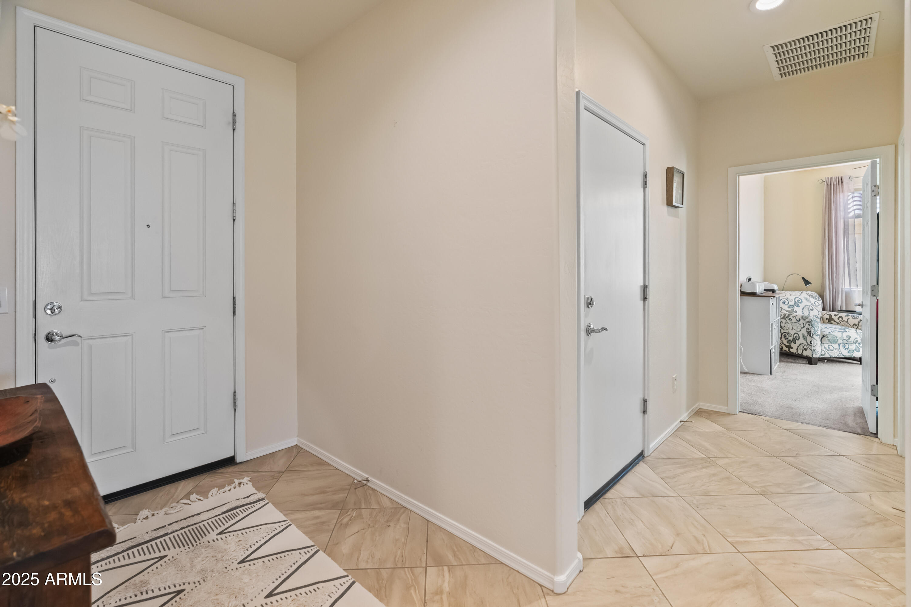 26990 West Utopia Road Buckeye, AZ 85396 - Photo 6 of 41 a view of a hallway with room and closet