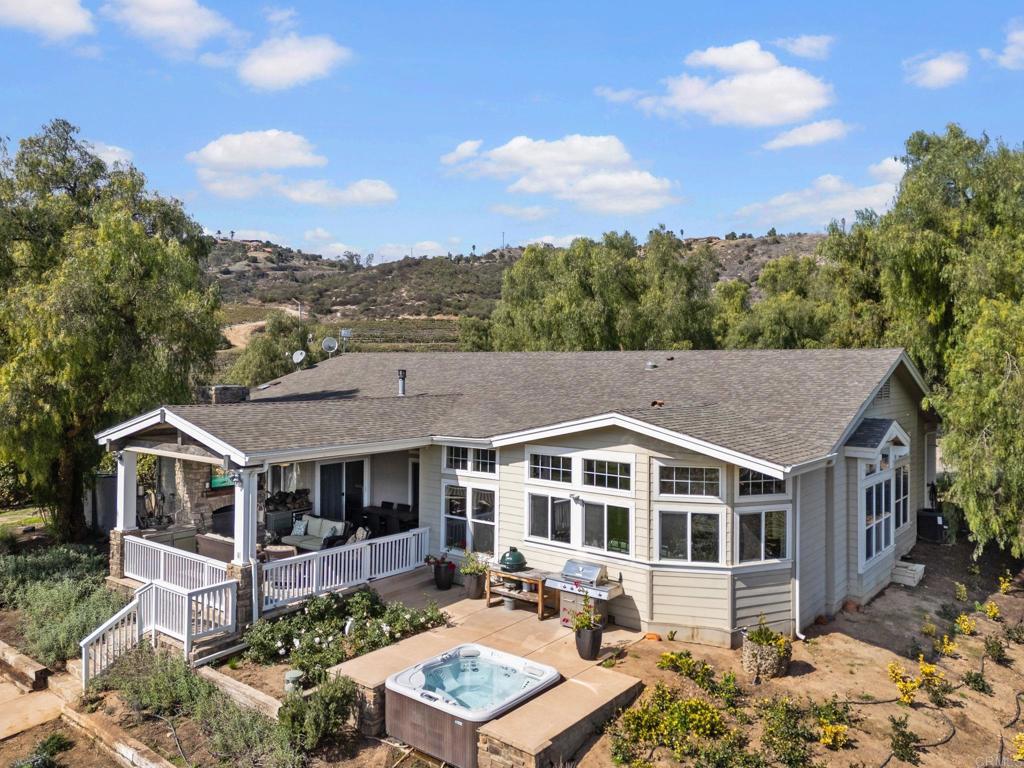 Undisclosed Address Valley Center, CA 92082 - Photo 12 of 60 a aerial view of a house with a yard