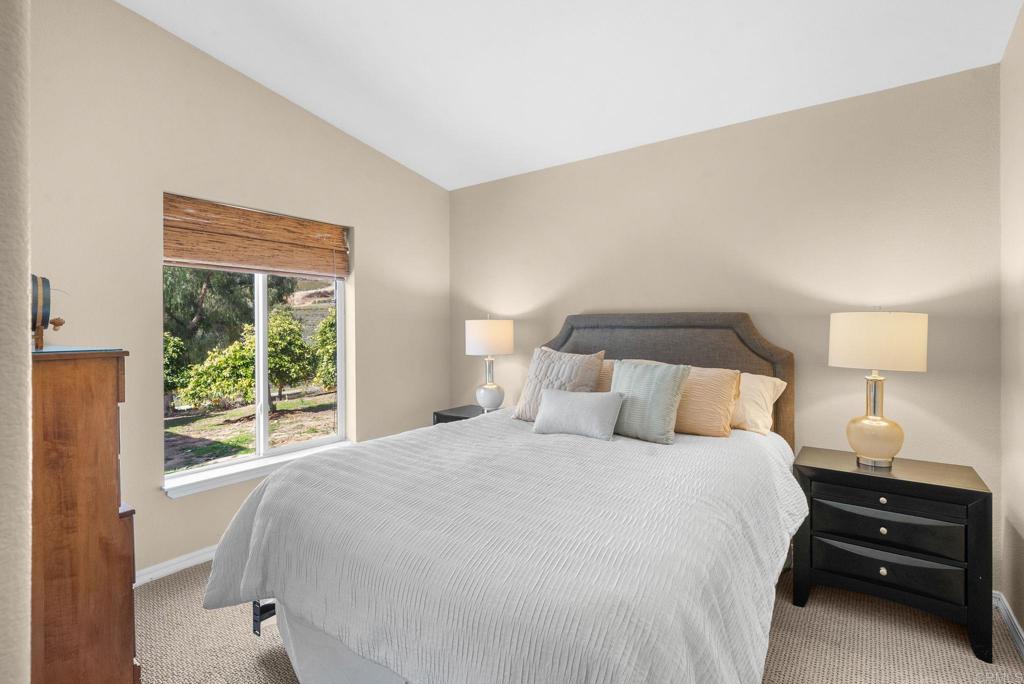 Undisclosed Address Valley Center, CA 92082 - Photo 30 of 60 a bedroom with a bed and a window