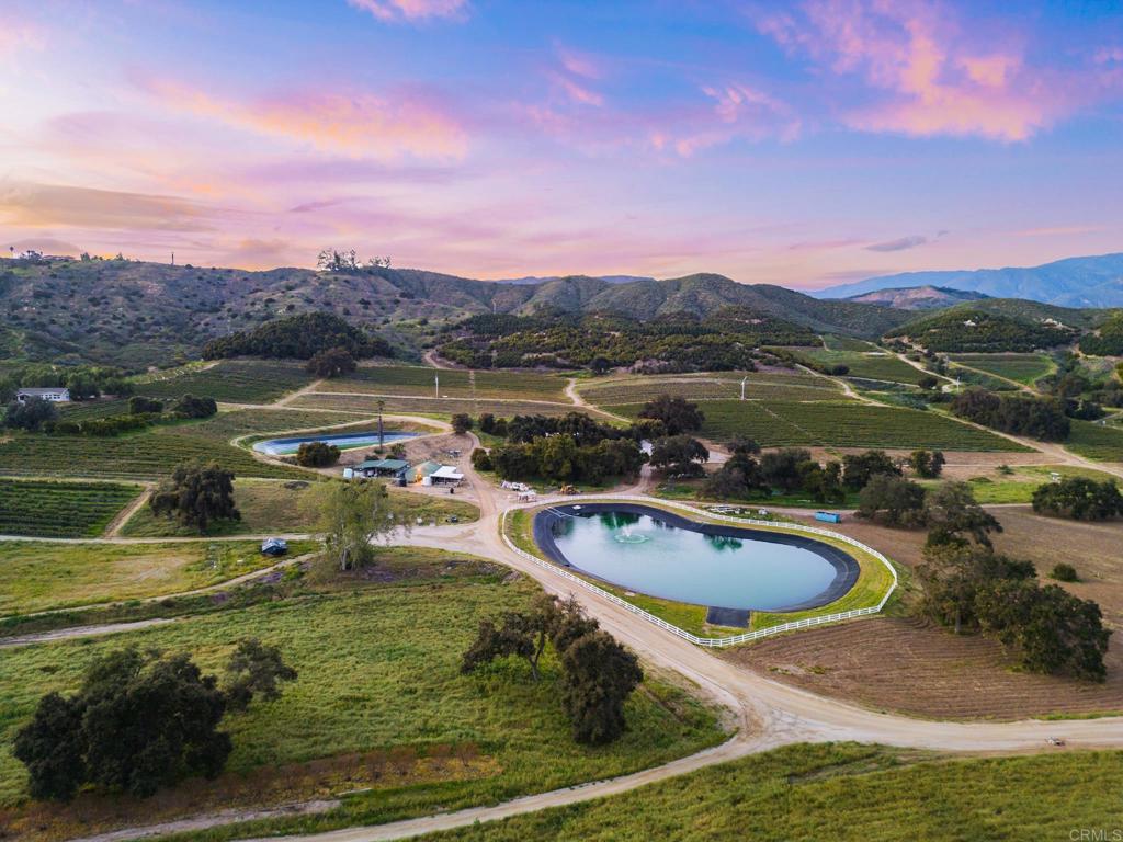 Undisclosed Address Valley Center, CA 92082 - Photo 3 of 60 a view of a swimming pool with a lake view