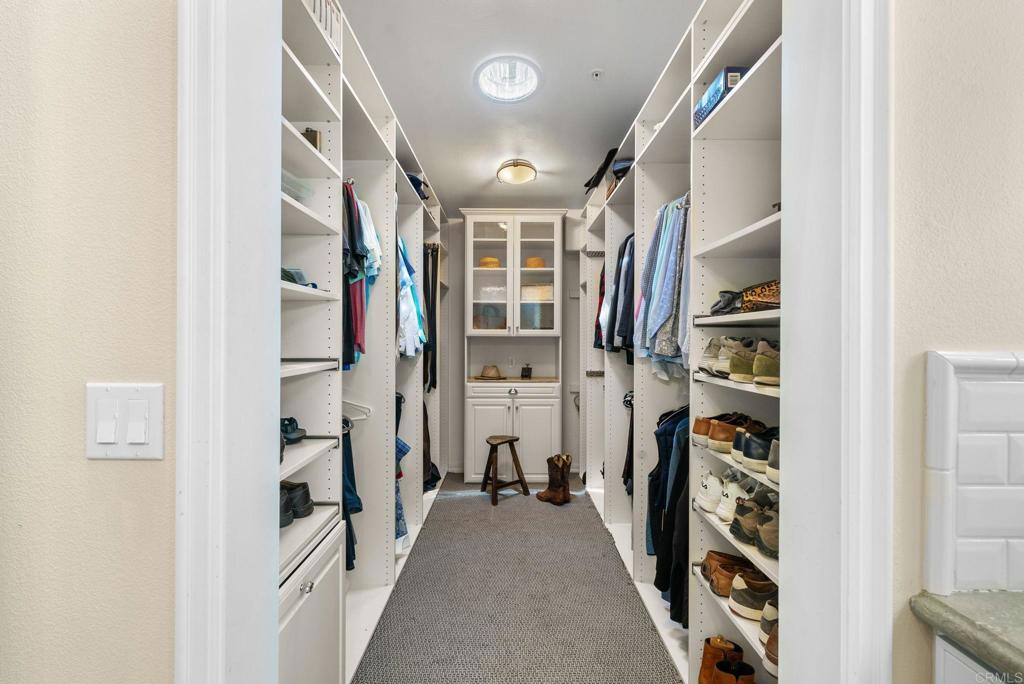 Undisclosed Address Valley Center, CA 92082 - Photo 33 of 60 a view of a hallway with wooden floor and entryway