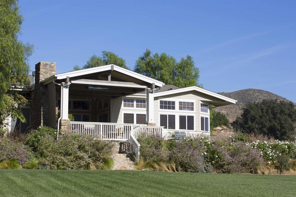 Undisclosed Address Valley Center, CA 92082 - Photo 36 of 60 a front view of a house with a yard