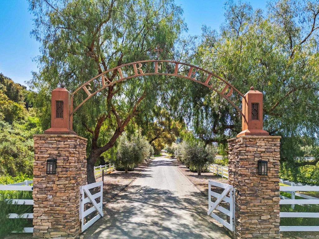 Undisclosed Address Valley Center, CA 92082 - Photo 60 of 60 a front view of a house with a yard