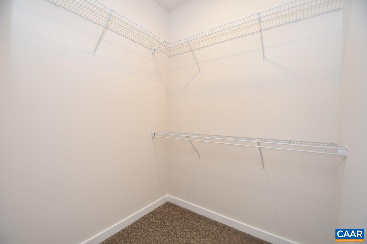 1060 Hanback Road Gordonsville, VA 22942 - Photo 15 of 19 a view of a room with racks on the wall