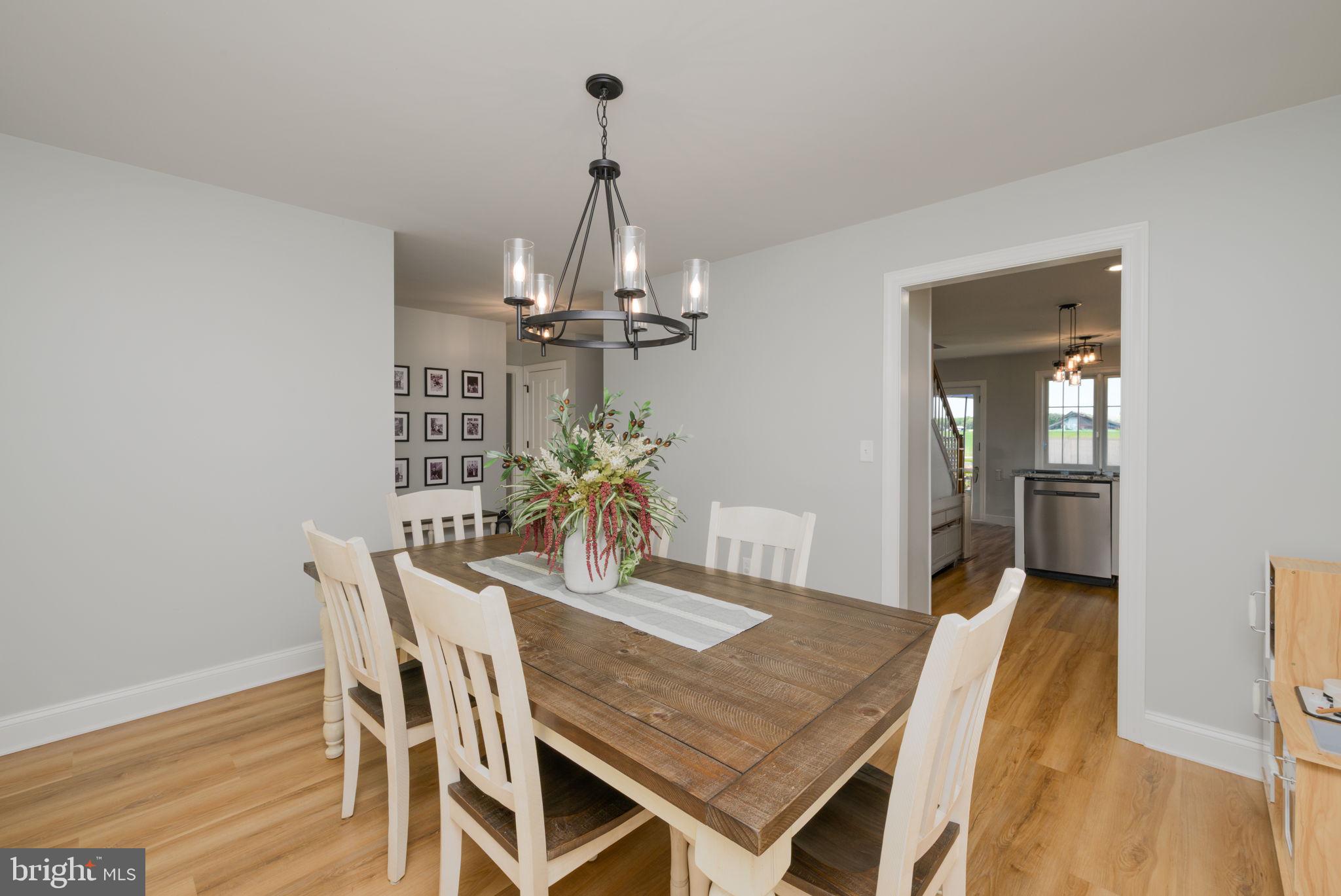 2649 Roberts Station Road Ingleside, MD 21644 - Photo 23 of 47 Charming dining space with modern flair.