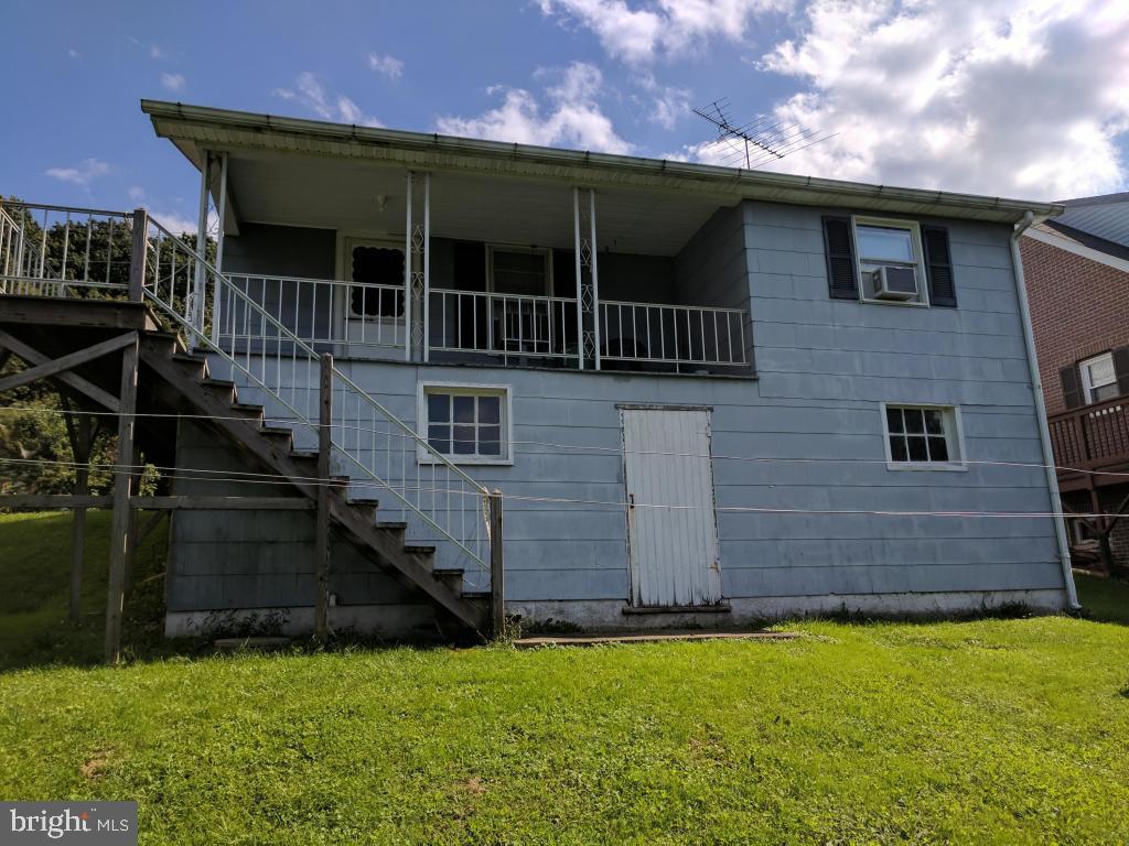 407 Chestnut Street Delta, PA 17314 - Photo 23 of 29 Rear shows Lower Level Storage and Basement Access
