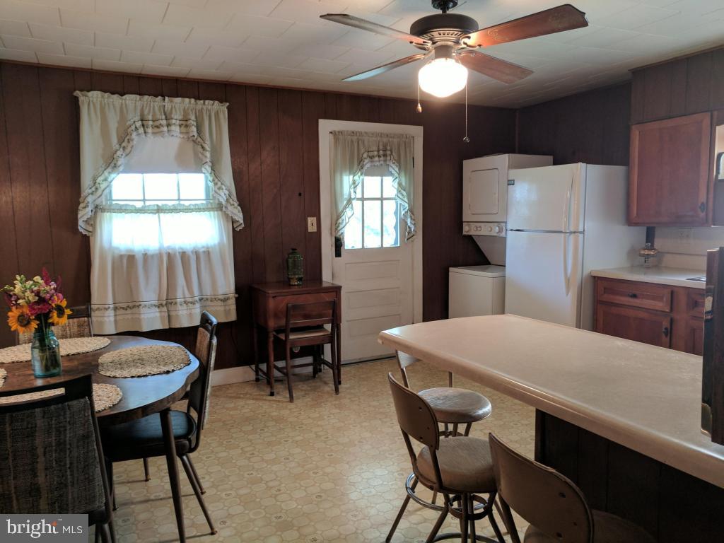 407 Chestnut Street Delta, PA 17314 - Photo 7 of 29 Open Kitchen with Breakfast Bar and Dining Area