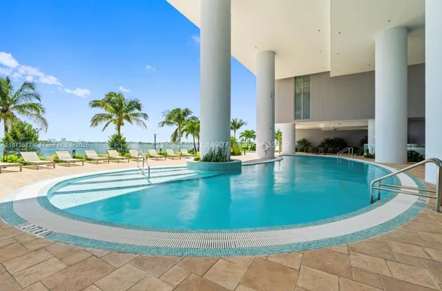 a view of a kitchen with kitchen island