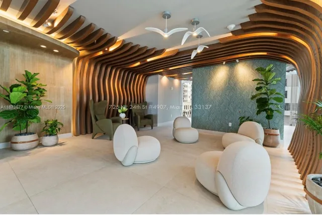 a view of a livingroom with furniture