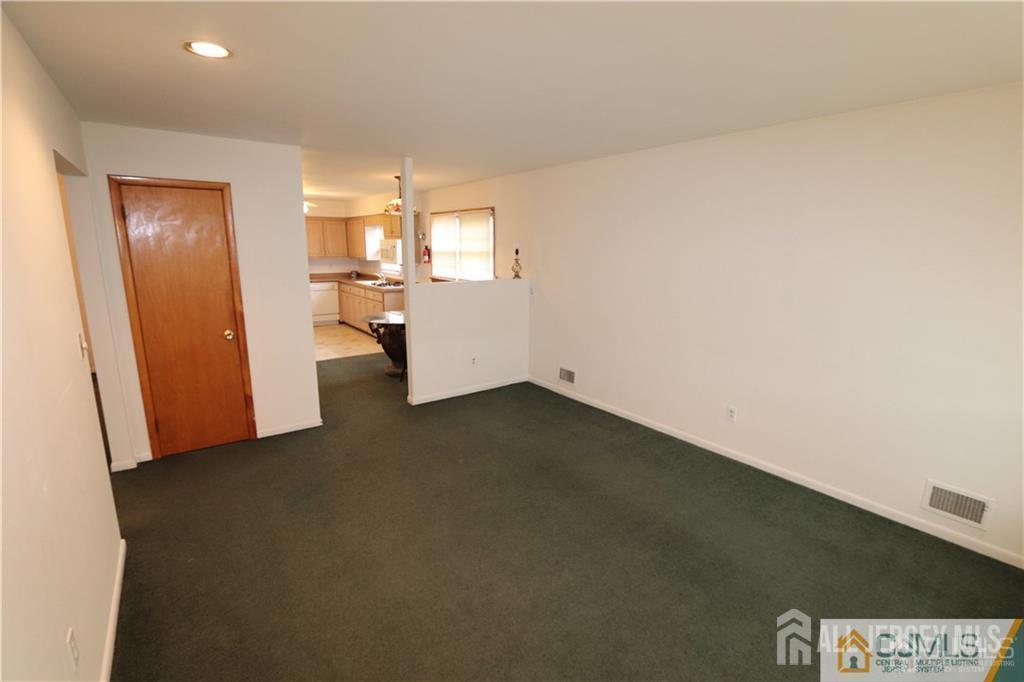 101 Stelton Road Piscataway, NJ 08854 - Photo 8 of 16 an empty room with windows