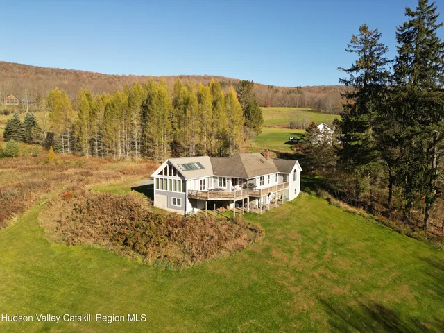 a view of an ocean from a mountain