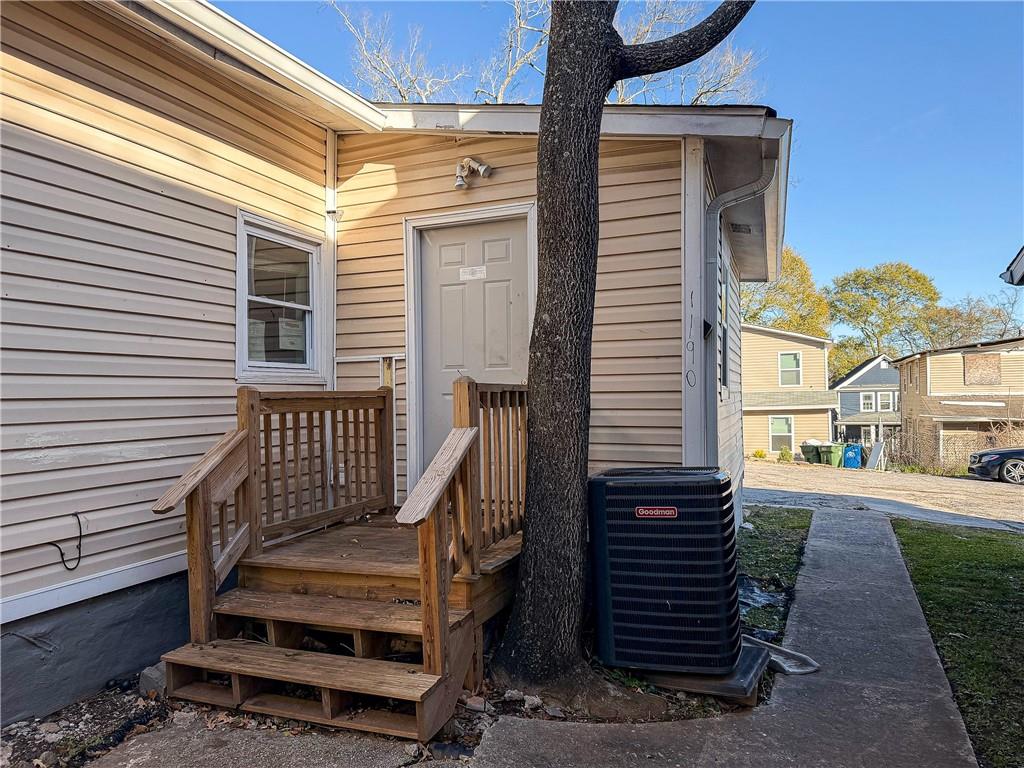 a view of a two chairs in the balcony
