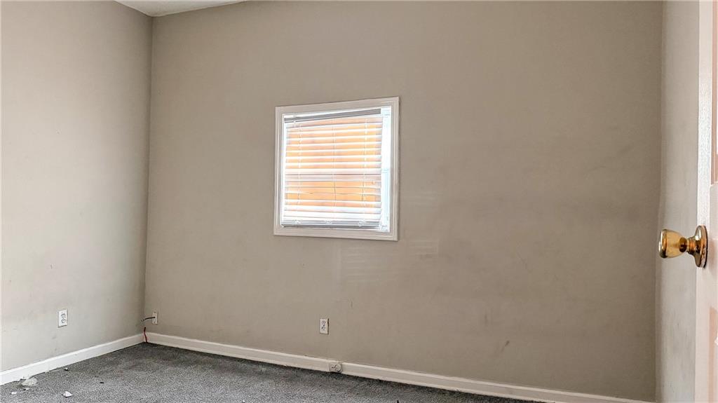 1188 Sims Street Southwest Atlanta, GA 30310 - Photo 11 of 17 an empty room with a window