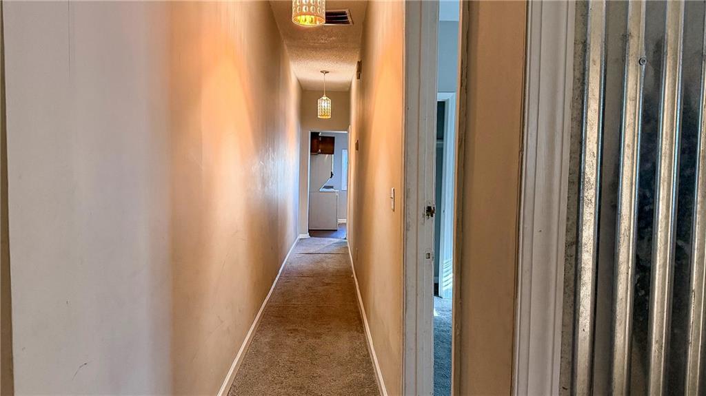 1188 Sims Street Southwest Atlanta, GA 30310 - Photo 14 of 17 a view of a bathroom from a hallway