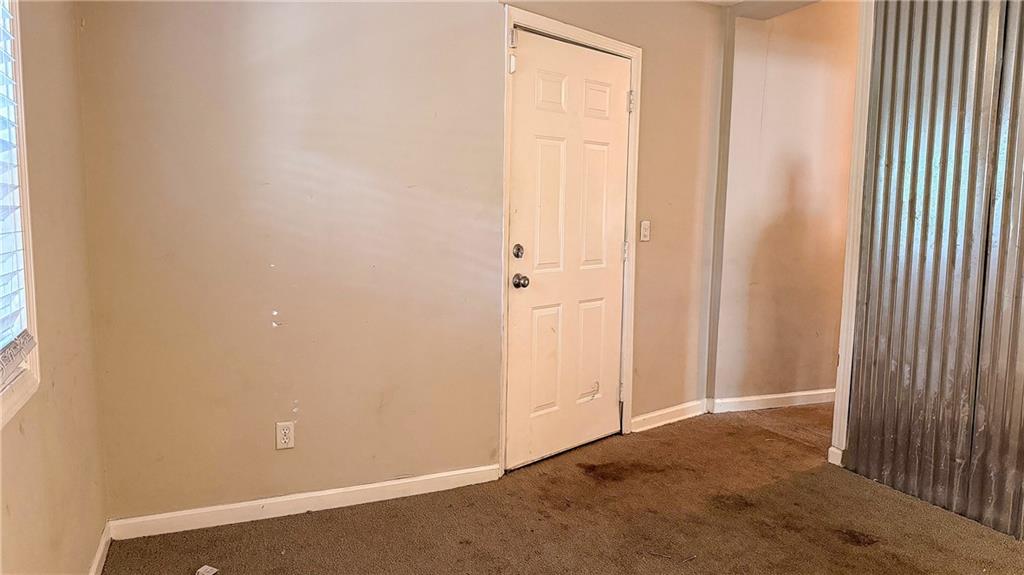 1188 Sims Street Southwest Atlanta, GA 30310 - Photo 17 of 17 an empty room with windows