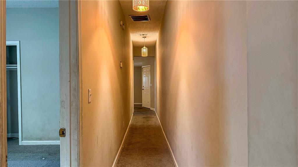 1188 Sims Street Southwest Atlanta, GA 30310 - Photo 8 of 17 a view of a hallway with wooden floor