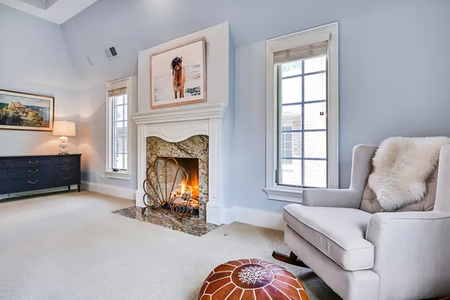 a large bathroom with double vanity and a large mirror