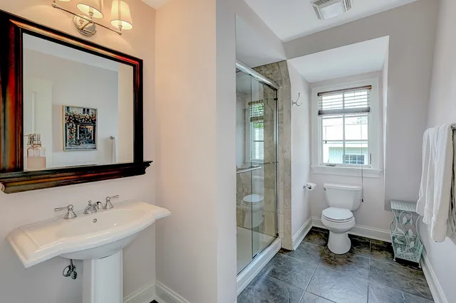 a view of a living room and a livingroom with furniture