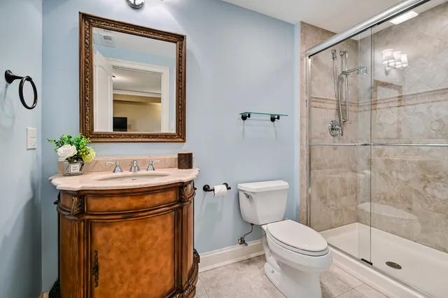 a view of a house with a porch and furniture
