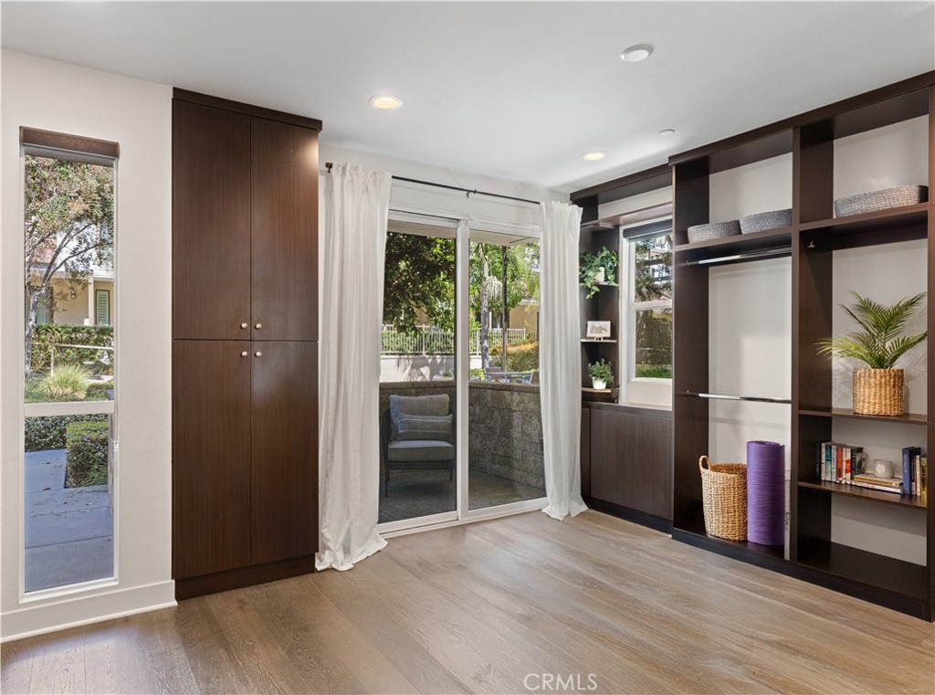 1675 Grand View Costa Mesa, CA 92627 - Photo 32 of 35 a view of livingroom with furniture and wooden floor