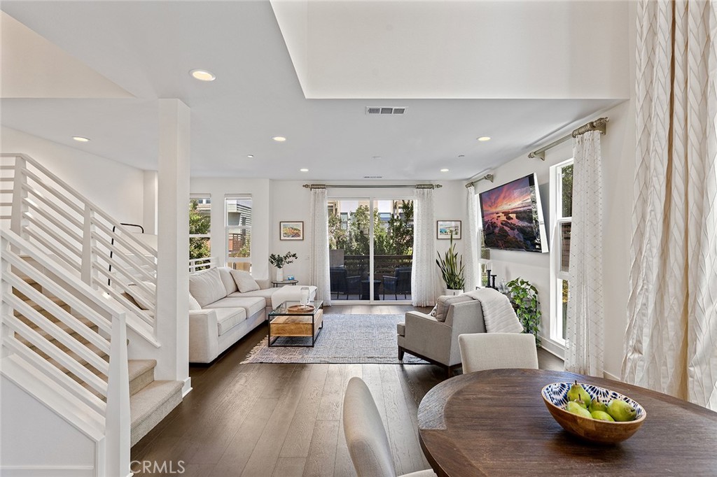 1675 Grand View Costa Mesa, CA 92627 - Photo 10 of 35 a living room with furniture and a large window