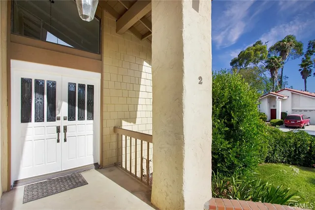 a view of a house with a small yard