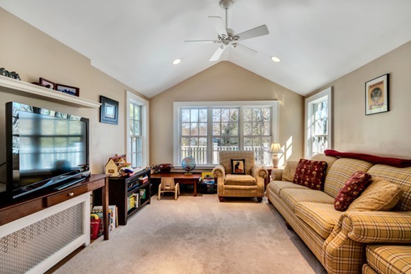 19 Pierrepont Road Winchester, MA 01890 - Photo 5 of 23 a living room with furniture and a flat screen tv