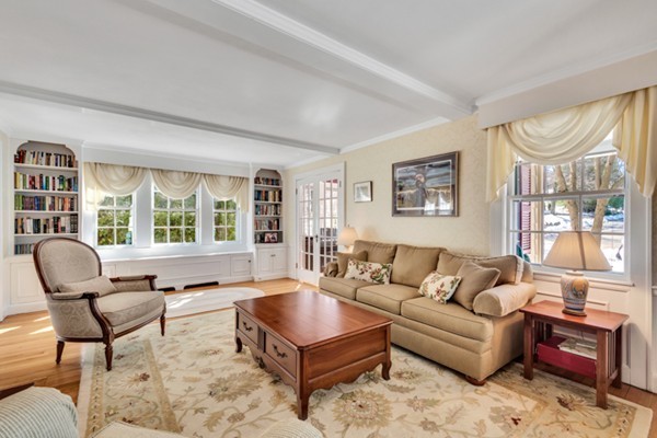 19 Pierrepont Road Winchester, MA 01890 - Photo 8 of 23 a living room with furniture and a large window
