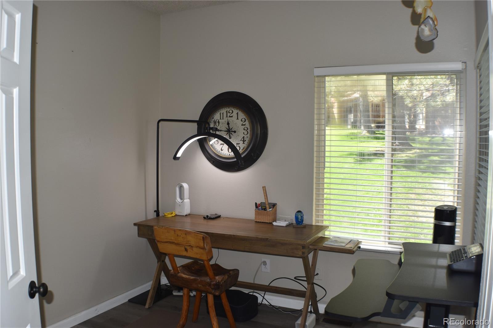 4075 Autumn Heights Drive, Unit F Colorado Springs, CO 80906 - Photo 13 of 44 a view of a dining room with a table and chairs