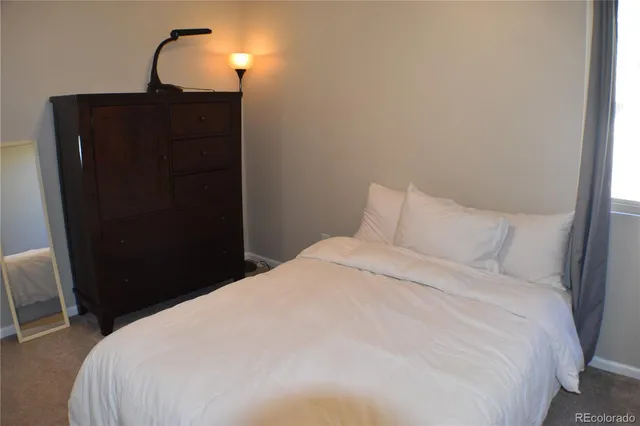 a view of a hallway with closet