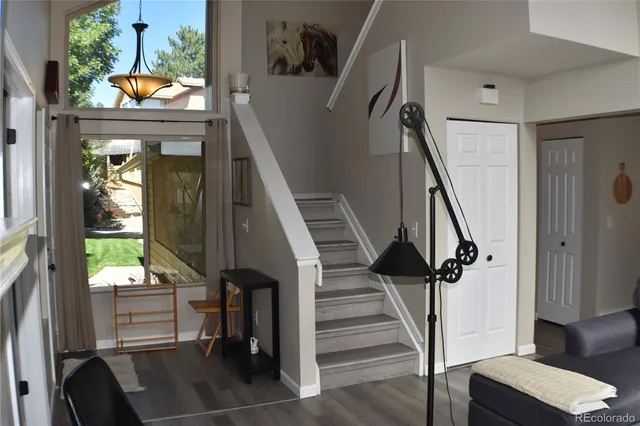 a view of staircase with a rug