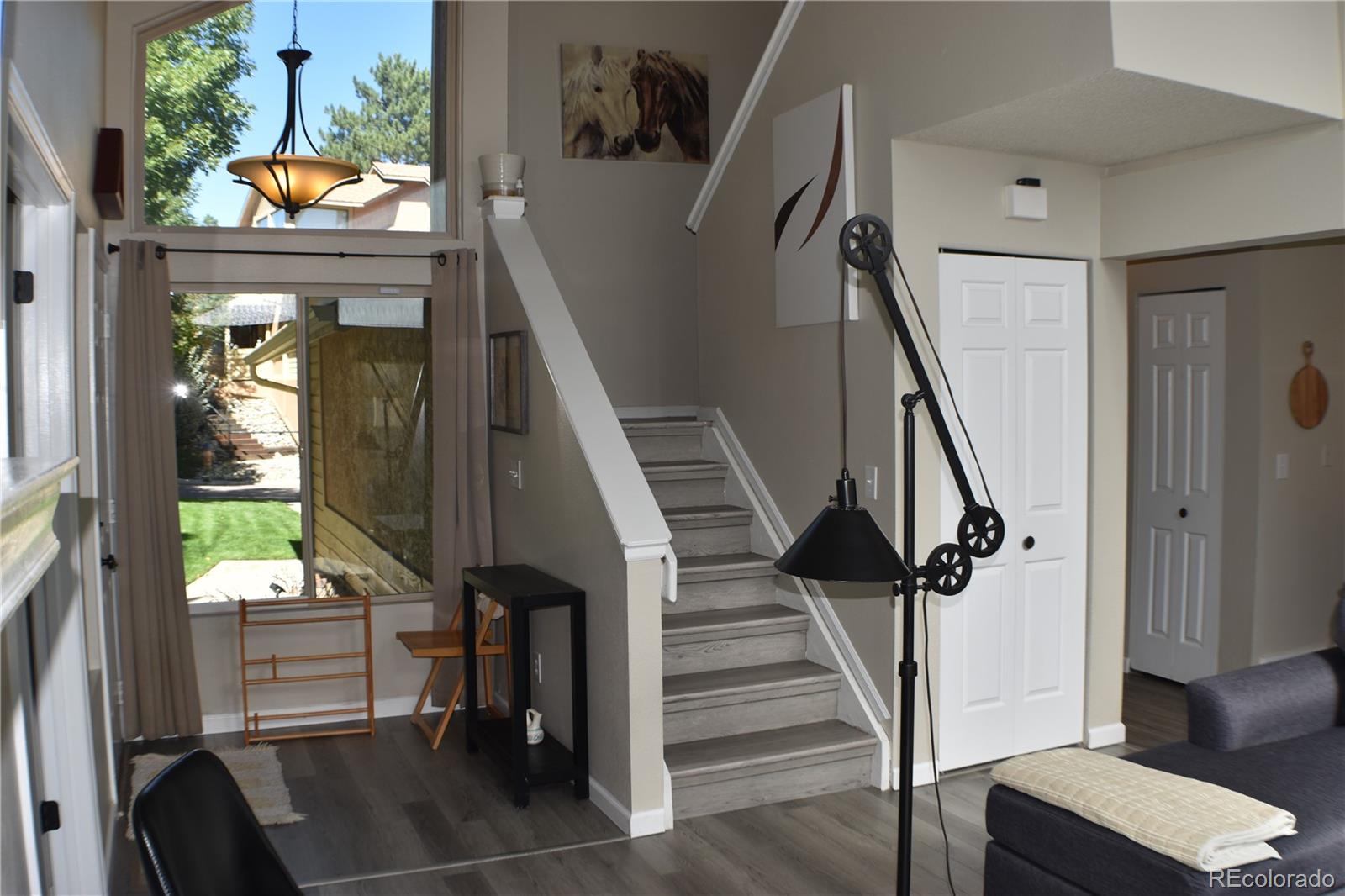 4075 Autumn Heights Drive, Unit F Colorado Springs, CO 80906 - Photo 6 of 44 a view of staircase with a rug