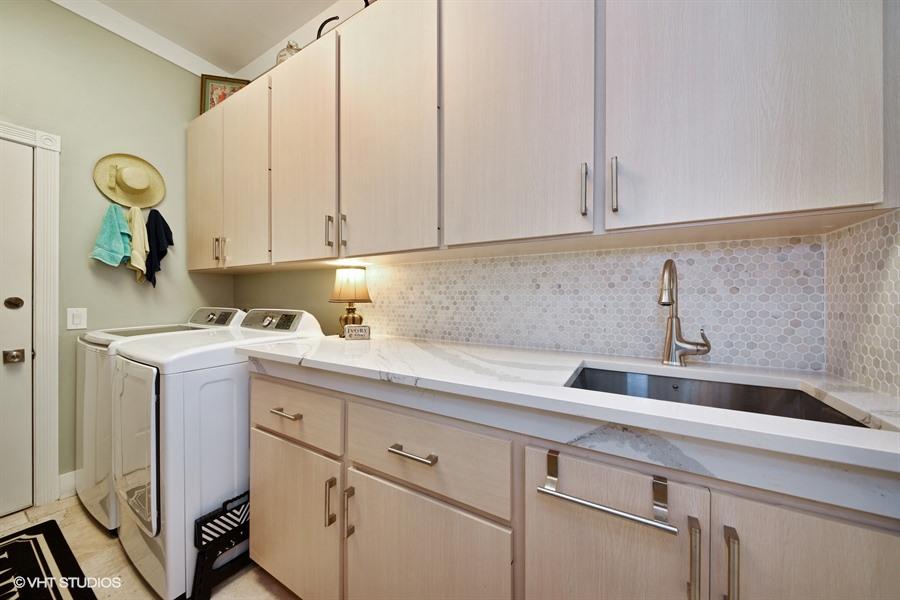 138 Hampton Circle Jupiter, FL 33458 - Photo 13 of 37 12_138HamptonCir_44_LaundryRoom_LowRes