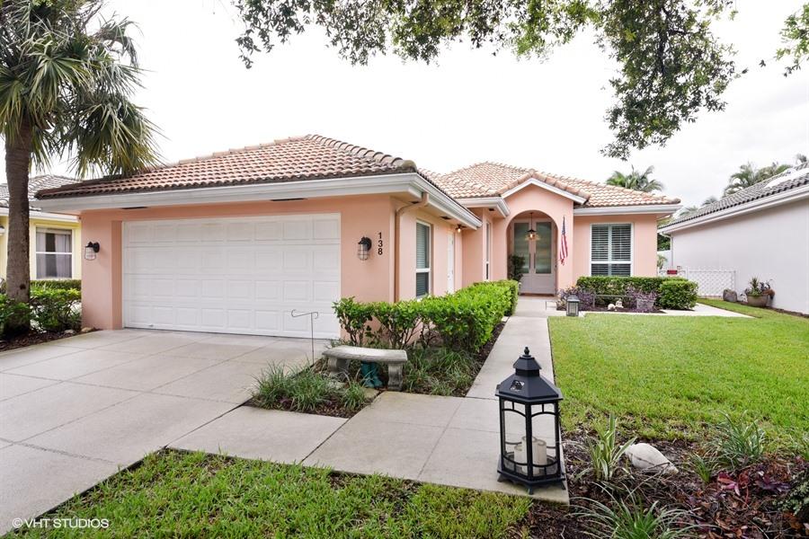 138 Hampton Circle Jupiter, FL 33458 - Photo 19 of 37 01_138HamptonCir_57_FrontView_LowRes